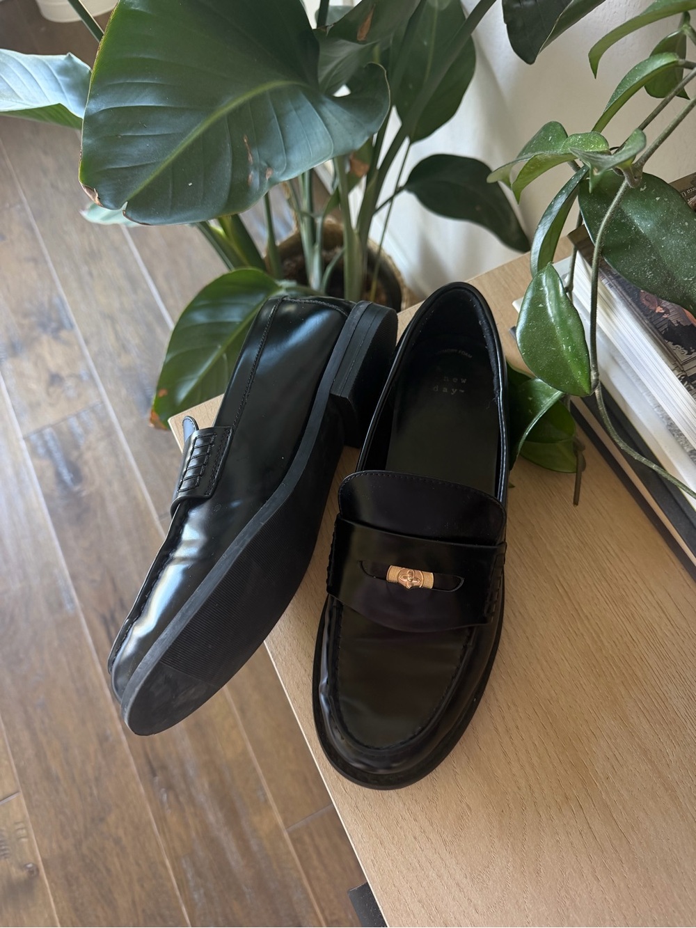 Black Women’s Leather Penny Loafers with Gold Accent